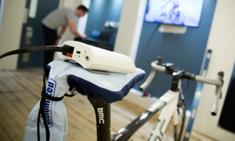 A saddle pressure mapping tool over Helen Pidd’s saddle, being monitored by Morgan Lloyd, CycleFit’s bike fitting guru