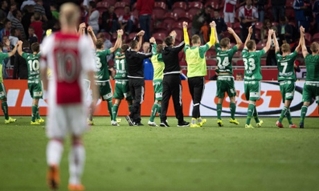 Rapid Vienna players celebrate after dumping Ajax out of Big Cup on their tails.