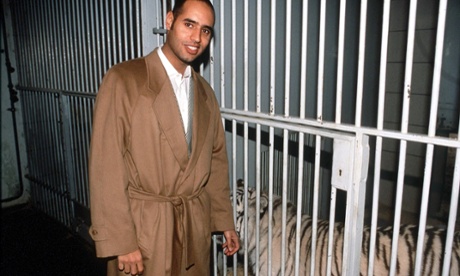 With his beloved pet white tigers