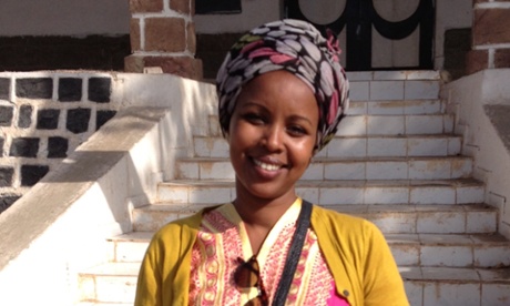 Sadia Ahmed sitting on steps