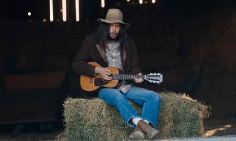 Hey, hay … Neil Young sits on some straw in 1971.