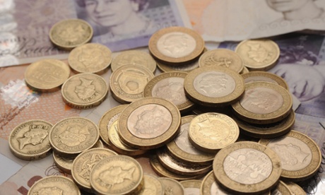 A selection of coins and bank notes.  It's critical to account for both the economic costs and benefits of cutting carbon pollution.