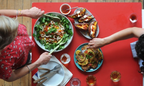 Ceviche with corn fritters and baked sweet potatoes