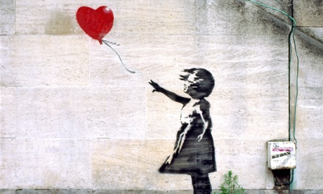 Banksy graffiti on the South Bank in London.