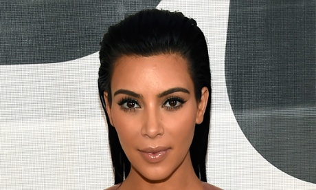 Kim Kardashian shows off her mega-brows.
