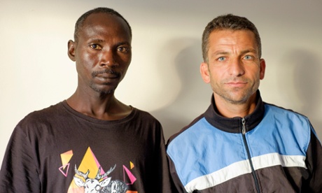 Adam Ishaq (left, 41), who has travelled to the UK from Darfur in Sudan via Calais, and Ali Mustafa (37), who has travelled from Syria via Calais, in London on Tuesday, August 4, 2015.Photograph:  Frantzesco Kangaris