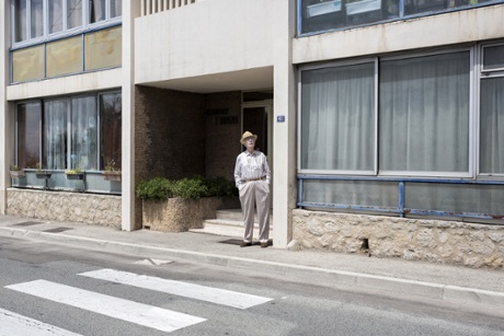 A man stands outside of his apartment, between Cagnes-sur-Mer and Marseille. (AP Photo/Laurent Cipriani)