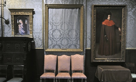 The empty frame, centre, from which thieves cut Rembrandt's Storm on the Sea of Galilee remains on display at the Isabella Stewart Gardner Museum in Boston.