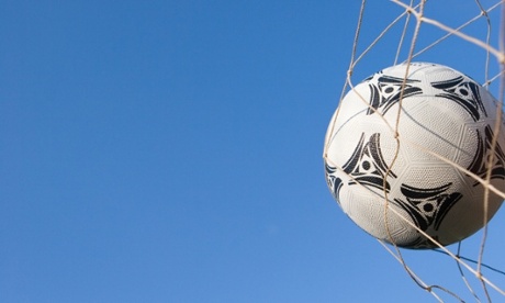 Football in goal netting