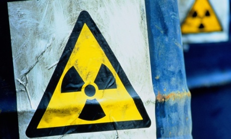 Blue drums displaying Radioactive sign, trefoil nuclear sign, radiation sign, symbol, looking like nuclear waste