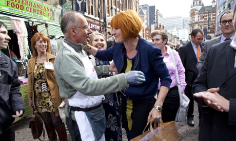 Mary Portas greets a stall-holder as she visits high street businesses in Croydon in 2012.