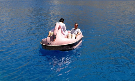 Two people on a pedalo