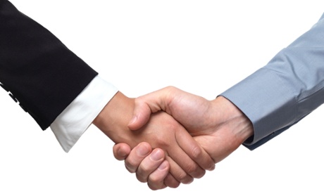 man and woman shaking hands