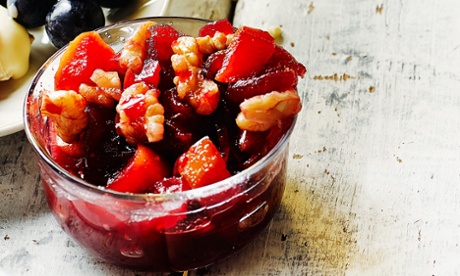 Apple, beetroot and walnut relish in bowl, upcycled table