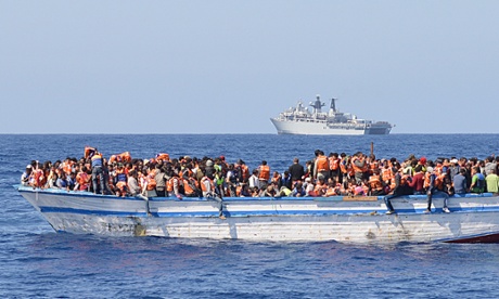 migrants in a boat libyan coast