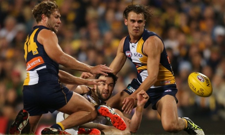 West Coast midfielders Mark Hutchings and Dom Sheed outnumber Hawk Jordan Lewis