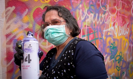 Aida Alves, 76, masked and ready to paint.