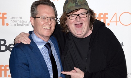 Michael Moore with Tiff moderator Thom Powers.