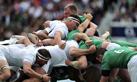 England and Ireland go into a scrum at a World Cup warm-up game earlier this month.