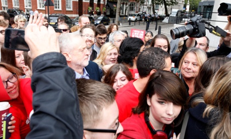 Party time: Labour supporters celebrate the victory of their new leader.