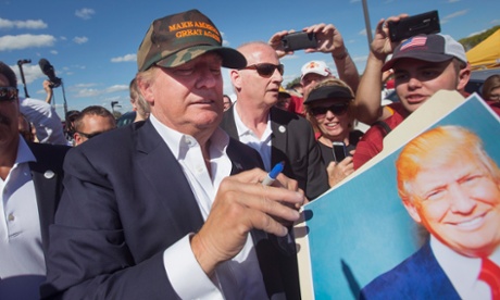 Donald Trump greets fans tailgating outside Jack Trice Stadium.