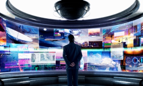 Man facing multiple computer screens