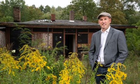 Thomas Harding outside his grandmother's old lakeside family home.