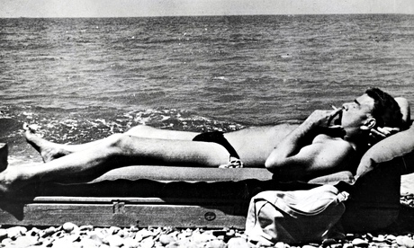 Cambridge spy Guy Burgess relaxes on a Black Sea beach.