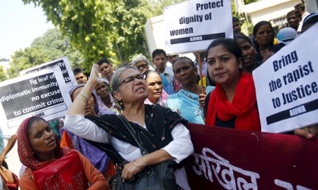 Indian women's rights demonstrators hold a protest outside Saudi Arabia's embassy in New Delhi over the alleged rape of two Nepali maids by a diplomat.
