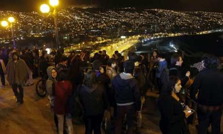 A group of people who left their houses in Valparaiso, Chile, late 16 September 2015, after a tsunami alert was issued for the earthquake of 8.3 on the Richter scale. A strong earthquake of magnitude 8.3 rattled Chilean capital Santiago and other regions of the country the US Geological Service reported.