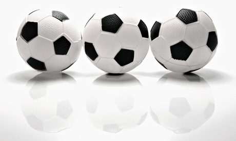 three footballs in a row