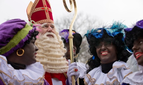 The Dutch version of Santa Claus and his sidekicks known as  Black Pete in Hoorn, north-western Netherlands in 2013.