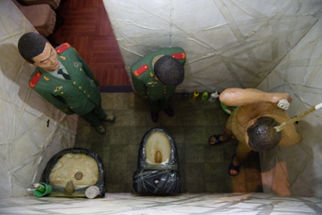 Ai's work S.A.C.R.E.D., in which six dioramas contain half-lifesize effigies of himself and his guards