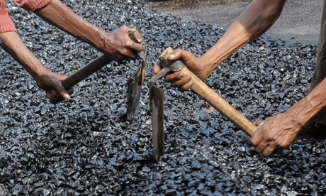 labourers construct a road, India