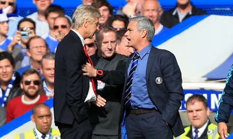 Chelsea manager Jose Mourinho (right) has a heated exchange with Arsenal manager Arsene Wenger (left) on the touchline during the Barclays Premier League match at Stamford Bridge, London.