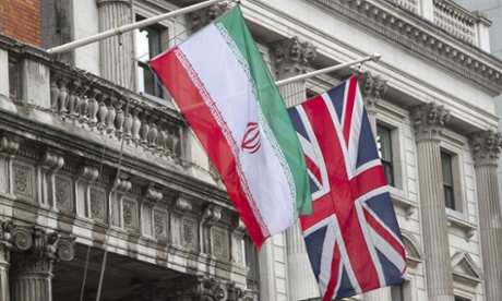 The flags of the United Kingdom and Iran fly next to each other in London.