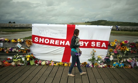 Floral tributes left on the Old Tollbridge near the A27 at Shoreham.