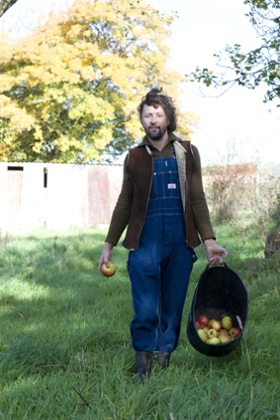 Nature's bounty: collecting windfalls in the orchard.