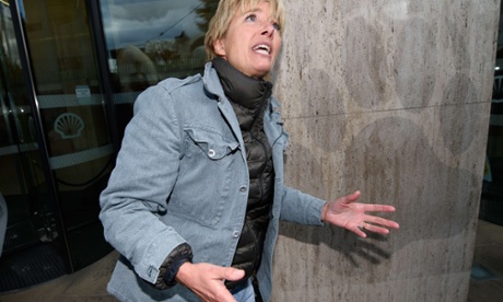 British actress Emma Thompson helps to place a series of stickers featuring the names of those who signed a global petition against Artic drilling onto Shell HQ in London.