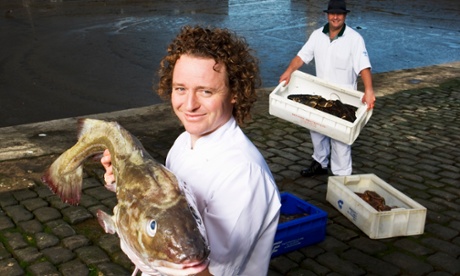 Chef Tom Kitchin with fish from George Campbell fishmongers at Newhaven, Edinburgh where some of the shellfish and fish is landed.