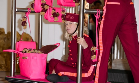 Hill's son Hudson, joyriding on a luggage trolley