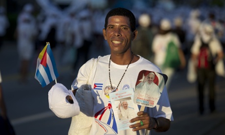 A man poses for a photo as he arrives at the Plaza of the Revolution Plaza