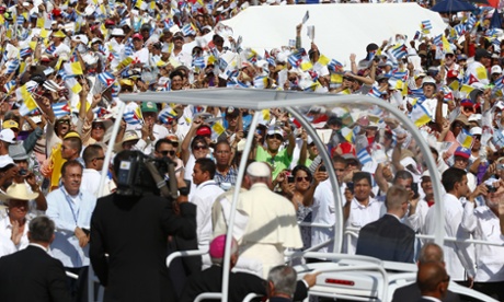 Pope Francis arrives to lead a mass for Catholic faithful in the city of Holguin