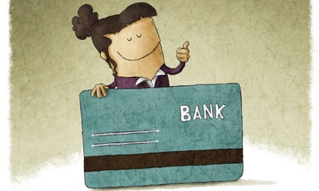 Smiling businesswoman holding her debit card