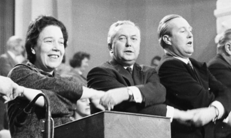 Harold Wilson, centre, sings Auld Lang Syne at the 1963 Labour conference with MPs Alice Bacon and Anthony Greenwood.