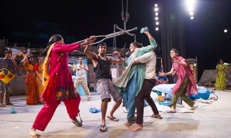 Thusitha Jayasundera, in pink and Meera Syal, in green, in <em>Behind the Beautiful Forevers</em> at the National Theatre.