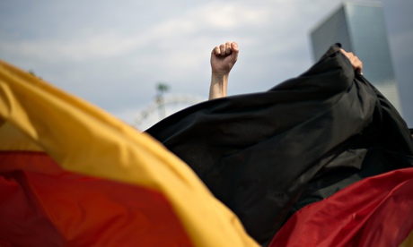 The national flag is waved following Germany's World Cup final victory in 2014