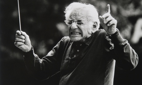 Leonard Bernstein conducting, wincing as a wrong note is played