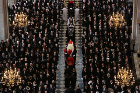 The coffin of Margaret Thatcher is carried in St Paul's Cathedral during her ceremonial funeral on 17 April 2013.