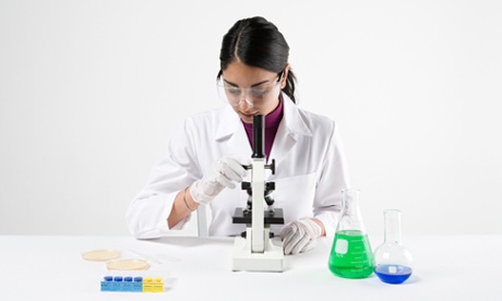 Scientist with microscope